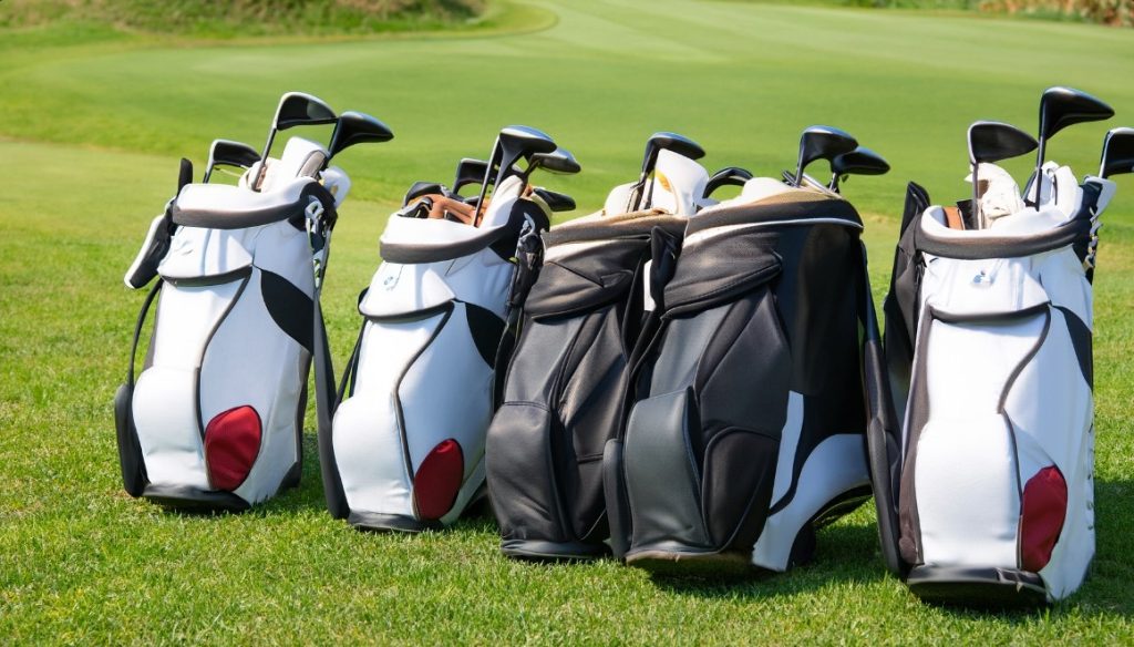 Golf stand bags on grass