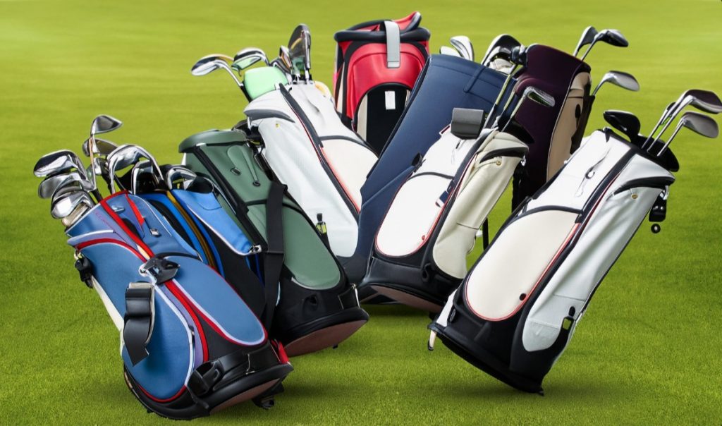 selection of golf bags in different styles and colors